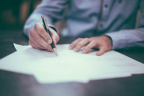 Insurance and risk leaders reviewing protected documents